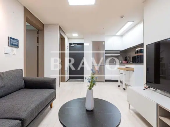 Living room with sofa and TV Short-Term Rent - Fully Furnished 2BR Apartment in Gangnam